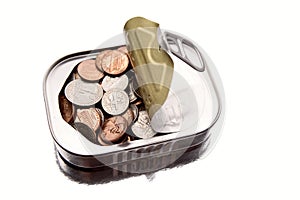 Coins inside tin