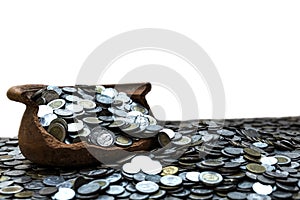 Coins in jar from on pile lots coin with blurred background, Money stack for business planning investment and saving