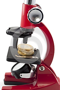 Coins and microscope