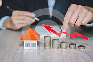 Coins money setting growth up increase to house model for concept investment mortgage finance and home loan business, business,