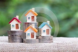 Coins money setting growth up increase to house model for concept investment mortgage finance and home loan business, business,