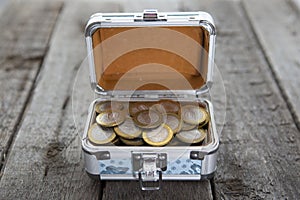 Coins money in small box on table. Ruble.