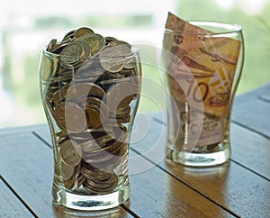 Coins and note drink for charity