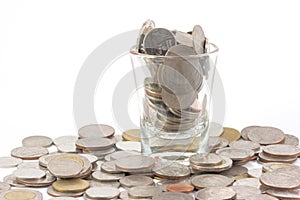 Coins over the glass be comparable to greed of human photo