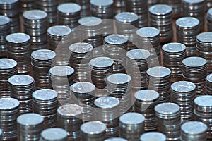 Coins are placed in bars and rows.