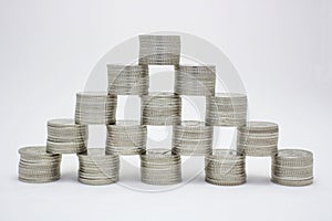 Coins pyramid isolatet on white background