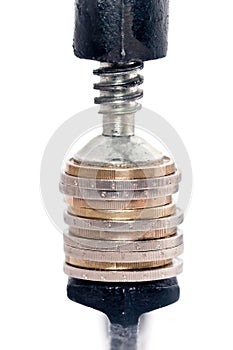 Coins squeezed in vise
