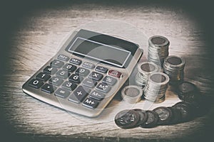 Coins Stack and calculator. Concept of money saving, financial. Savings money and income Investment ideas and financial management