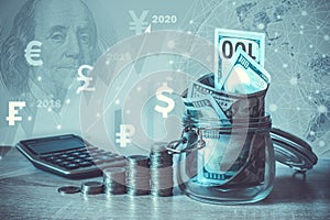 Coins Stack, calculator, dollar bills in glass jar, virtual hologram, earth, stat, graph,currency icons different countries in