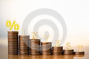 Coins stacking and Wooden Blocks with INVEST.