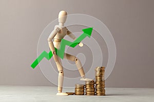 Coins Stairway Up and Up Arrow Graphics. Businessman is going up by the coins. Business profit growth.
