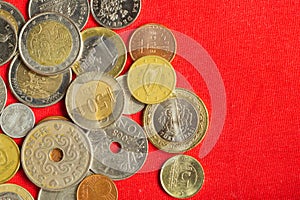 Coins of the various countries. many metal coins of different denominations and different countries. finance background