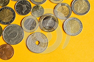 Coins of the various countries. many metal coins of different denominations and different countries. finance background