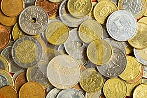 Coins of the various countries. metal coins of different denominations and different countries. finance background