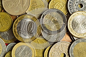 Coins of the various countries. metal coins of different denominations and different countries. finance background