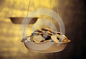 Coins on weighing machine