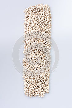 Coix lacryma-jobi : Close-up shot of coix seeds nourishing food for the elderly. on white background