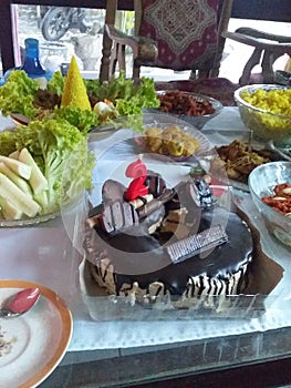 Cokes and food on the table photo