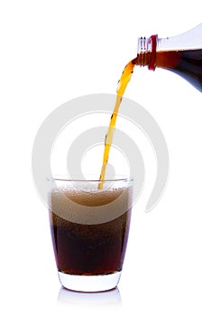 Cola in glass with ice cubes on white background