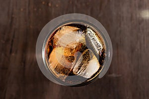 Cola and ice in a clear glass