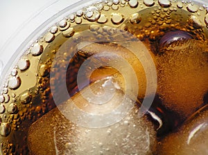 Cola with ice cubes