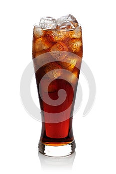 Cola with ice cubes in a glass. photo