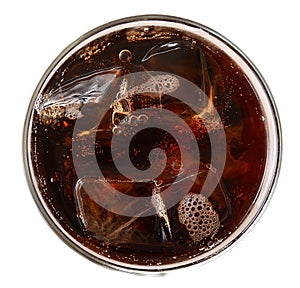 Cola with ice cubes in glass top view isolated on white background, clipping path included photo