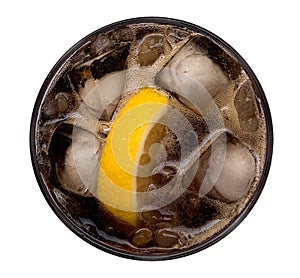 Cola with ice cubes and yellow lemon sliced in glass top view isolated on white background, path