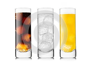 Cola orange and lemonade soda drink with ice cubes in highball glass