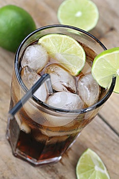 Cola soda drink with ice cubes