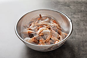 Colander with fresh shrimps