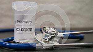 Potential treatment with the drug Colcorona for the coronavirus covid-19 with a stethoscope photo