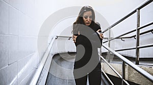 Cold Adult Woman Walk Hopeless Down the Ramp