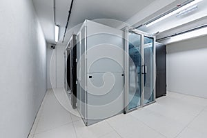 Cold aisle containment and in-row cooling rack units of computer data center