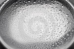 Cold aluminum can with water drops or dew close-up macro shot