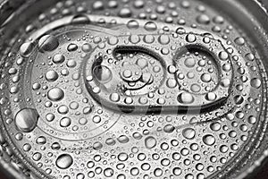 Cold aluminum can with water drops or dew close-up macro shot
