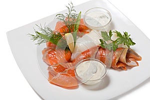 Cold appetizer of smoked halibut, salted trout, sockeye salmon s