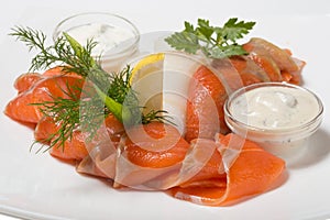 Cold appetizer of smoked halibut, salted trout, sockeye salmon s