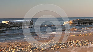 Cold Baltic sea in winter with icy beach