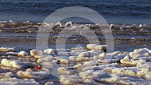 Cold Baltic sea in winter with icy beach