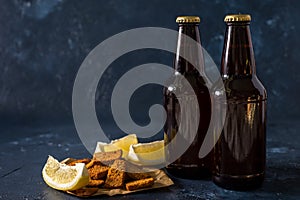 Cold beer bottle in droplets of water of their refrigerator