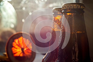 Cold beer bottle in droplets of water of their refrigerator