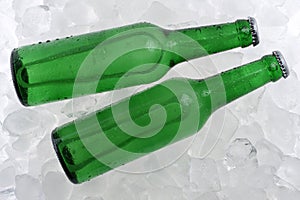 Cold beer in bottles on ice