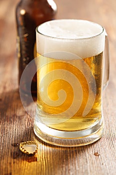 Cold beer glass on bar or pub desk