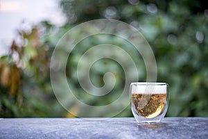 Cold beer served in pitchers. on the natural background