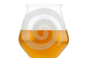 Cold beer in a Teku tasting glass half filled, drops of water on glass and foam, isolated on a white background with a clipping pa
