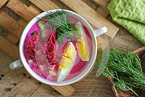 Cold beetroot soup with sausage, egg and vegetables