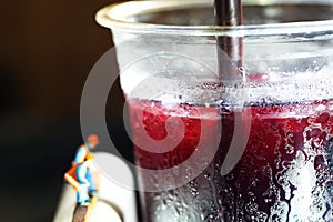 Cold beverage plastic cup scene.