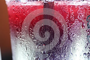 Cold beverage plastic cup scene.