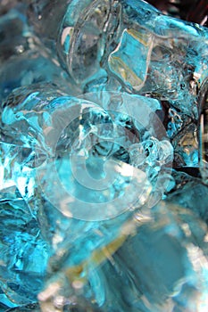 Cold blue,teal and beige colored ice cubes.